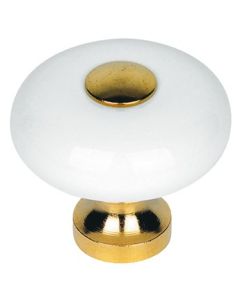 Classical porcelain knob with brass foot.